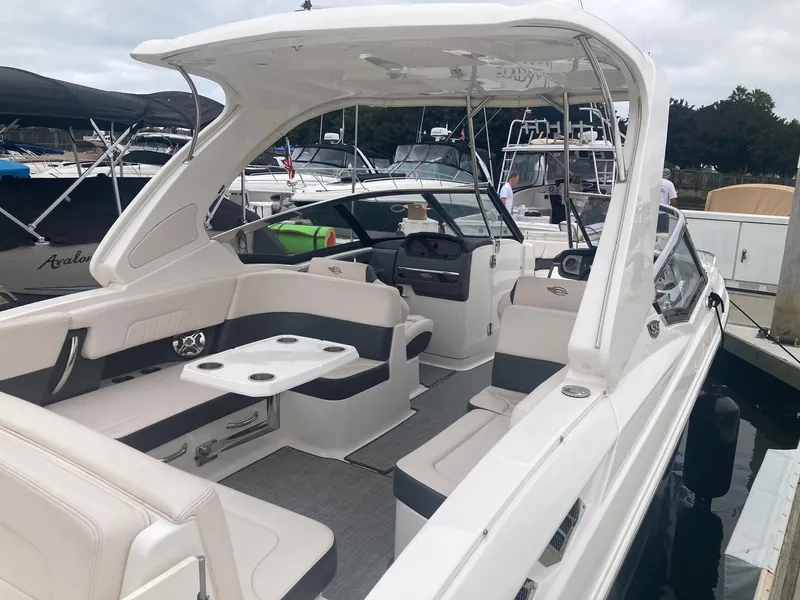 Slide: The Image of Interior view of a 2017 Chaparral 307 SSX boat at the dock. - 6
