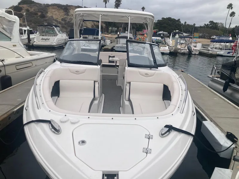 Slide: The Image of 2017 Chaparral 307 SSX boat docked in marina. - 8