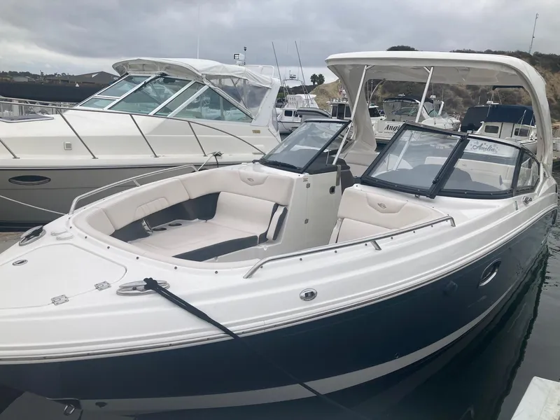 Slide: The Image of 2017 Chaparral 307 SSX boat docked in harbor. - 9