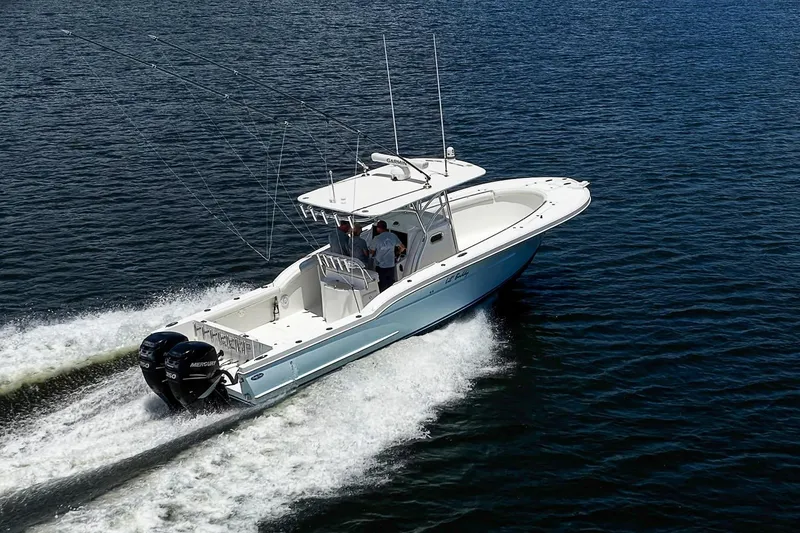 Slide: The Image of 2008 Buddy Davis 34 Center Console boat cruising on open water. - 20
