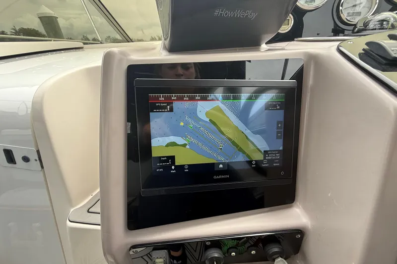Slide: The Image of Garmin navigation display on 2003 Rinker Fiesta Vee 342 boat dashboard. - 36