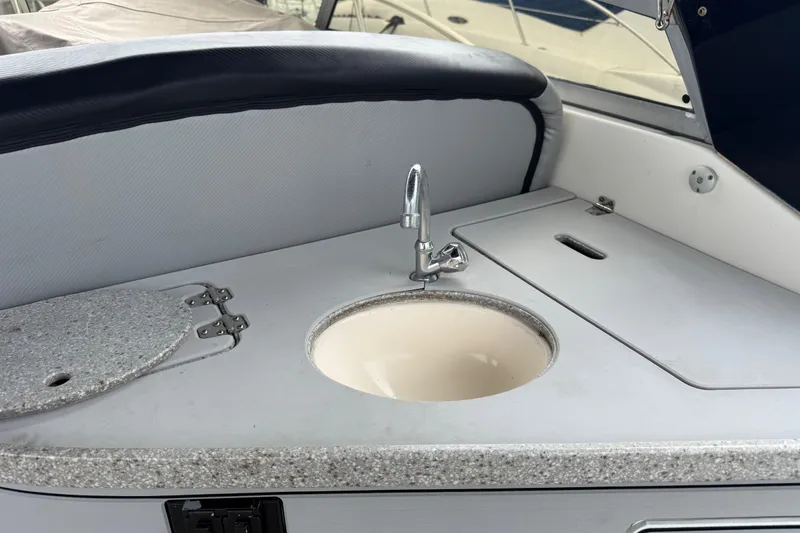 Slide: The Image of 2003 Rinker Fiesta Vee 342 boat interior with sink and countertop. - 37