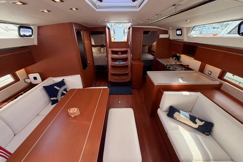 Slide: The Image of Luxurious interior of 2020 Beneteau Oceanis 46.1 yacht with elegant wood finish and modern amenities. - 100