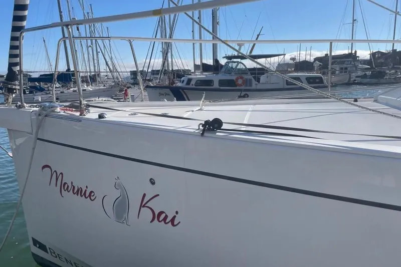 Slide: The Image of Beneteau Oceanis 46.1 sailboat docked in marina, 2020 model, named "Marnie Kai". - 11