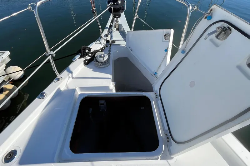 Slide: The Image of Beneteau Oceanis 46.1 (2020) yacht deck with open storage compartments. - 12