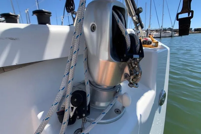 Slide: The Image of Close-up of Beneteau Oceanis 46.1 sailboat rigging, showcasing ropes and hardware, 2020 model. - 13