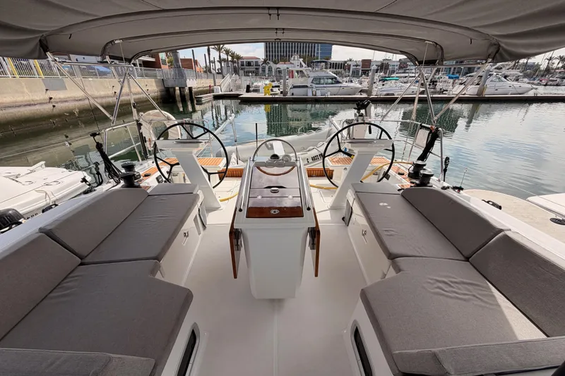 Slide: The Image of Spacious cockpit of 2020 Beneteau Oceanis 46.1 yacht docked at marina. - 39