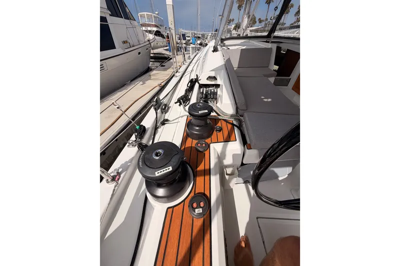 Slide: The Image of Cockpit view of 2020 Beneteau Oceanis 46.1 sailboat, featuring winches and seating. - 46
