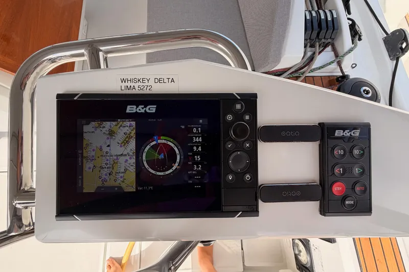 Slide: The Image of B&G navigation system on 2020 Beneteau Oceanis 46.1 yacht, displaying nautical charts and controls. - 52