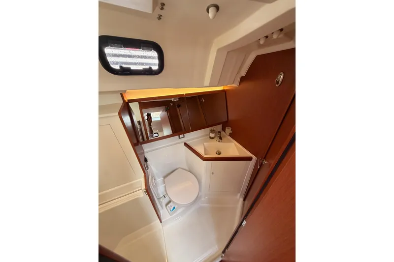 Slide: The Image of Interior of 2020 Beneteau Oceanis 46.1 yacht bathroom with sink and toilet. - 73