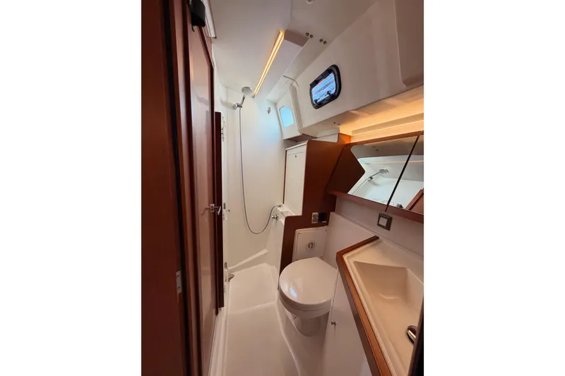 Slide: The Image of Modern bathroom in 2020 Beneteau Oceanis 46.1 yacht, featuring sleek design and compact amenities. - 80