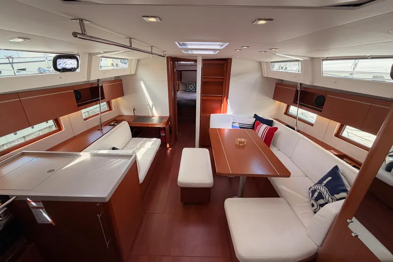 Slide: The Image of Luxurious interior of 2020 Beneteau Oceanis 46.1 yacht with elegant seating and dining area. - 82