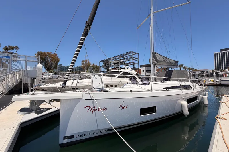 Slide: The Image of 2020 Beneteau Oceanis 46.1 sailboat docked at marina under clear blue sky. - 9