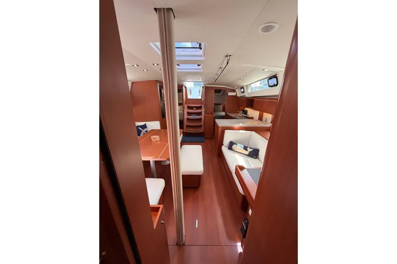 Slide: The Image of Interior of 2020 Beneteau Oceanis 46.1 yacht, featuring elegant wood finishes and modern design. - 97