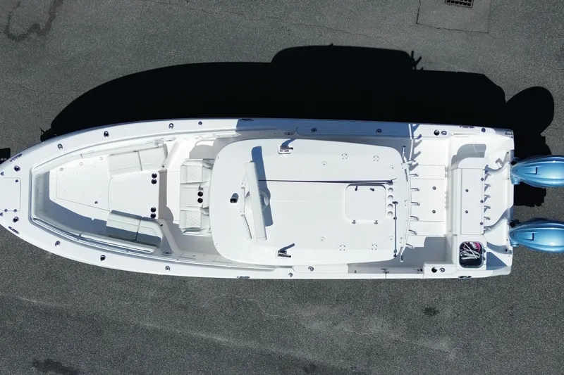 Slide: The Image of Overhead view of 2024 Everglades 365 Center Console boat with dual engines. - 31