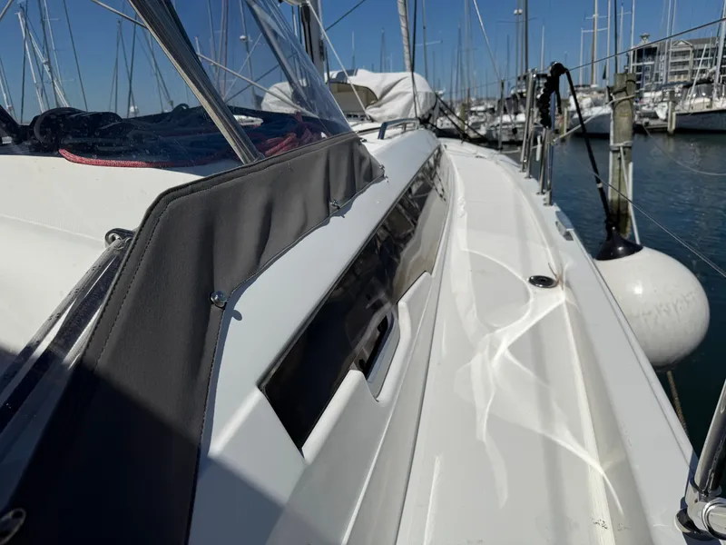 Slide: The Image of Jeanneau Sun Odyssey 410 sailboat in harbor, year 2023. - 22