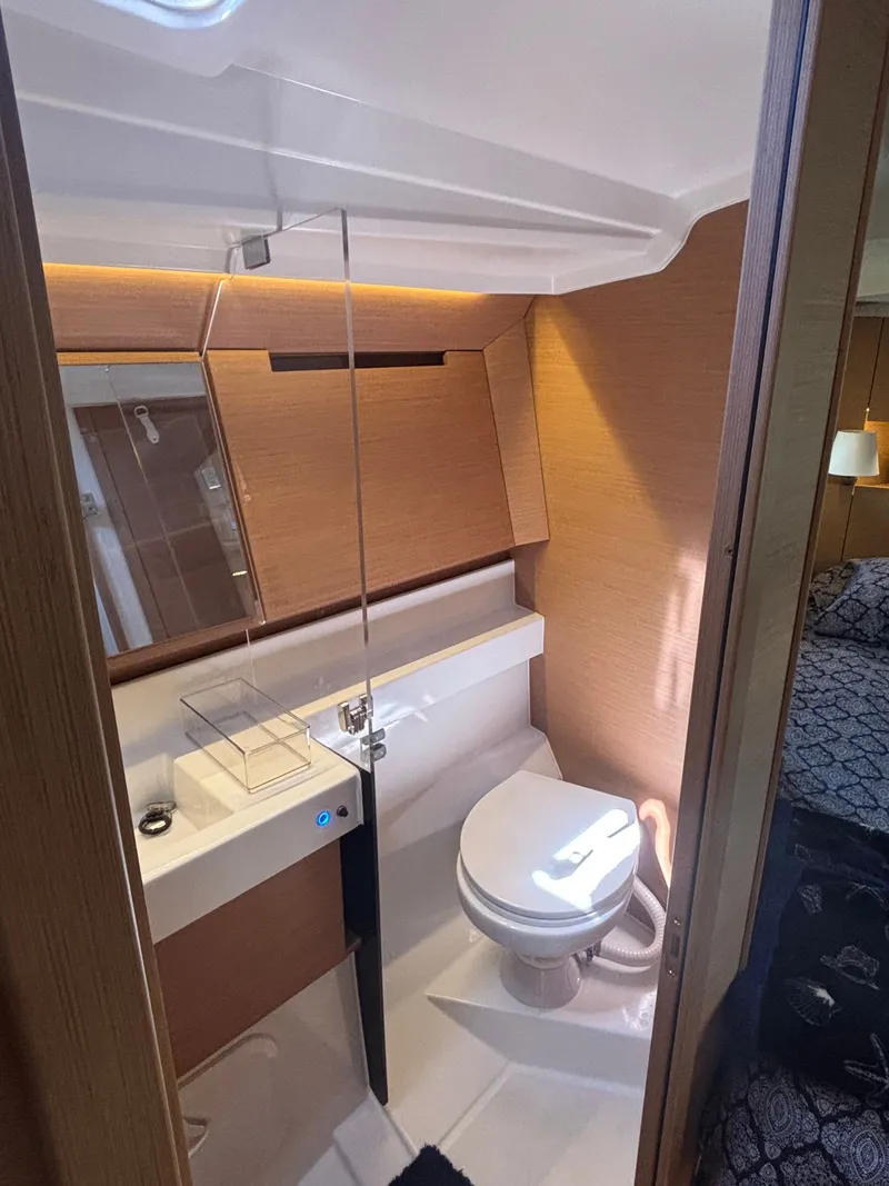 Slide: The Image of Interior view of Jeanneau Sun Odyssey 410 yacht bathroom. - 24