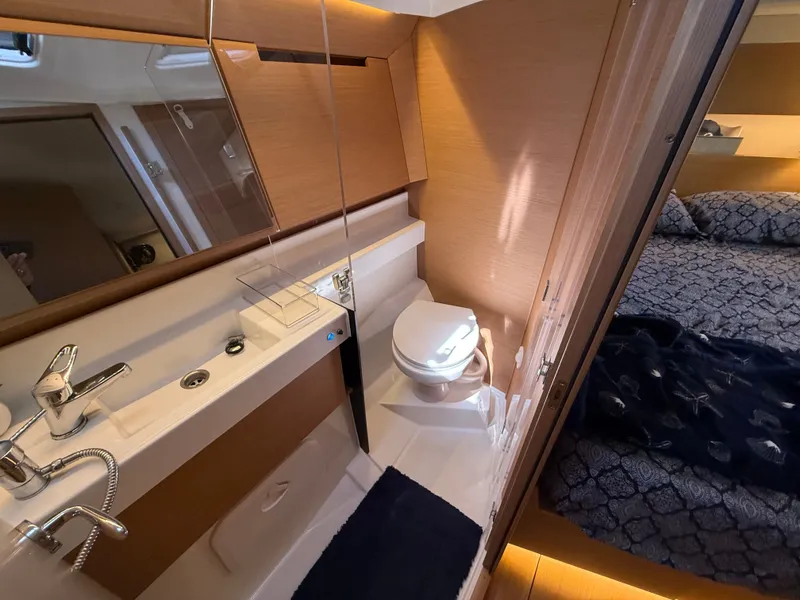 Slide: The Image of Interior of Jeanneau Sun Odyssey 410 yacht, bathroom and sleeping area. - 34
