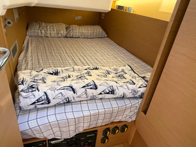 Slide: The Image of Interior of Jeanneau Sun Odyssey 410, cozy cabin with bed. - 37