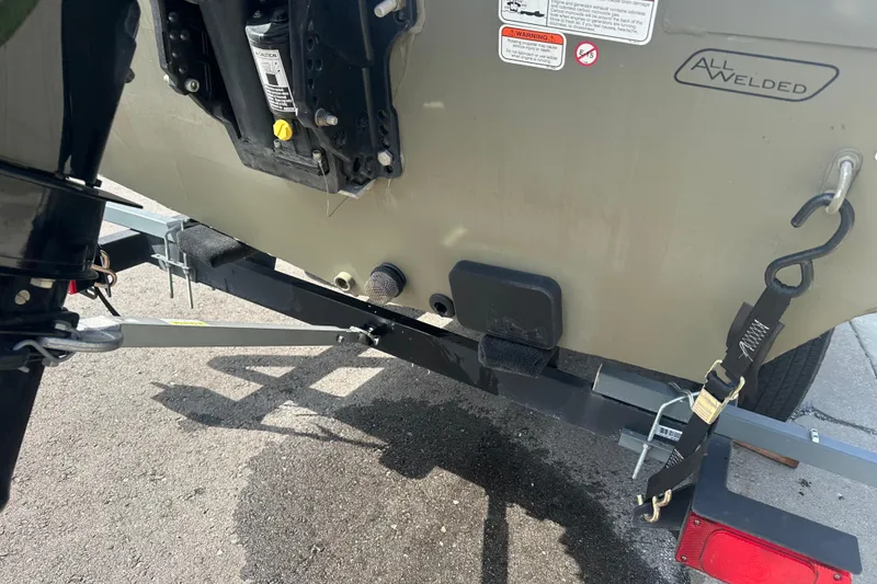Slide: The Image of 2024 Tracker Grizzly 1648 SC boat trailer hitch and rear view. - 15