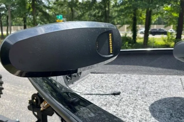 Slide: The Image of 2026 Tracker Pro Guide V-175 WT boat with PowerDrive motor in a wooded area. - 10