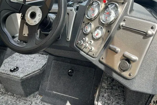 Slide: The Image of 2026 Tracker Pro Guide V-175 WT dashboard with steering wheel and instrument panel. - 5