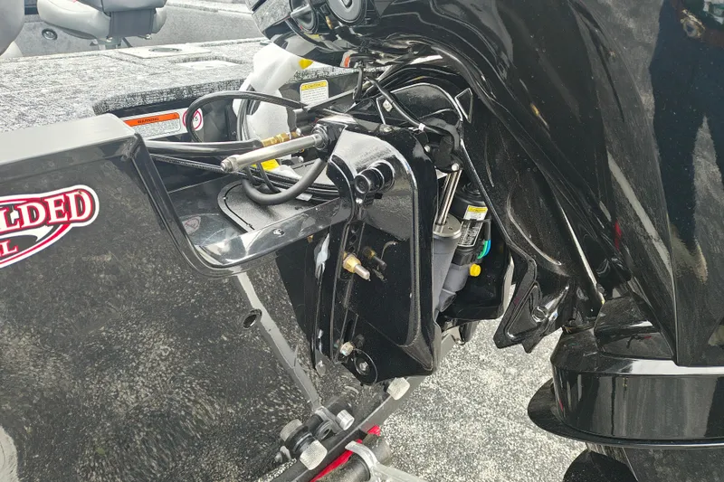 Slide: The Image of 2026 Tracker Pro Guide V-175 WT boat engine detail, showcasing hydraulic components and sleek design. - 5