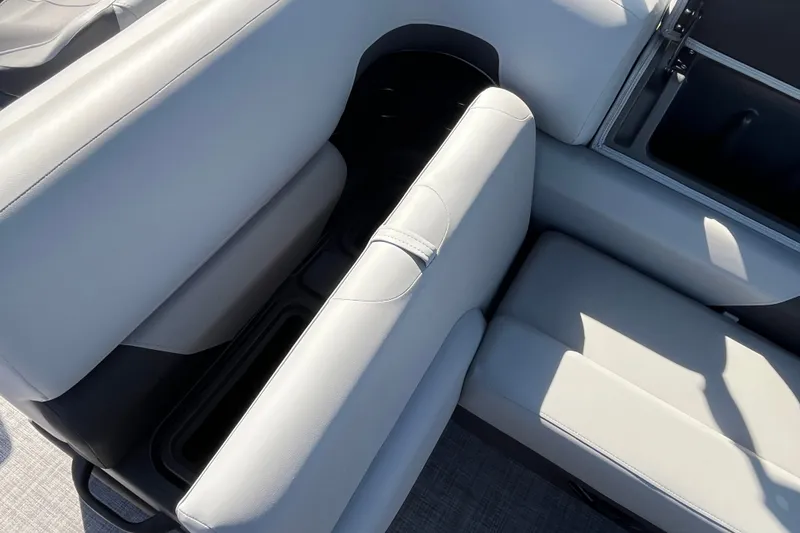 Slide: The Image of Sun Tracker SportFish 20 DLX 2026 boat interior seating with storage compartment. - 13