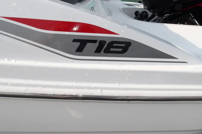 Slide: The Image of 2026 Tahoe T18 boat with sleek design and bold graphics. - 26