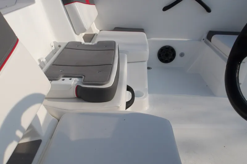 Slide: The Image of Interior seating of 2026 Tahoe T18 boat with modern design and speaker system. - 8