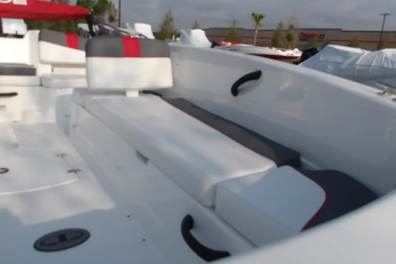 Slide: The Image of 2026 Tahoe T18 boat interior with white and red seating, showcasing modern design and comfort. - 7