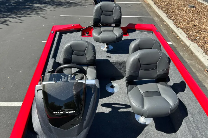 Slide: The Image of 2026 Tracker Pro Team 175 Crappie Edition boat with gray seating and red accents. - 17