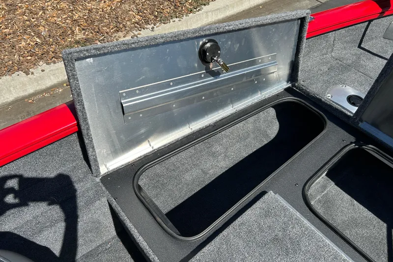 Slide: The Image of Open storage compartment on 2026 Tracker Pro Team 175 Crappie Edition boat. - 10