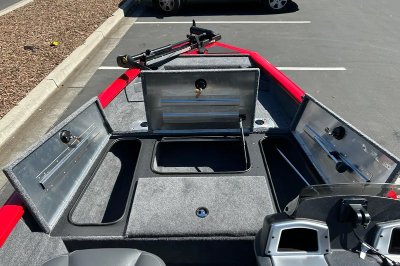 Slide: The Image of 2026 Tracker Pro Team 175 Crappie Edition boat interior with open storage compartments. - 9