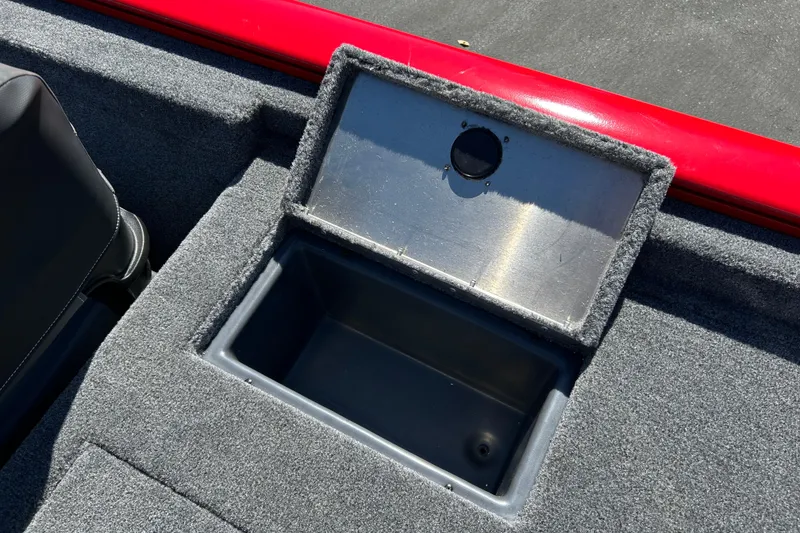 Slide: The Image of Open storage compartment on 2026 Tracker Pro Team 175 Crappie Edition boat. - 7