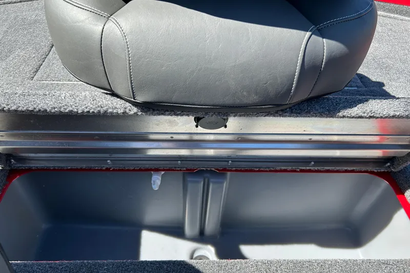 Slide: The Image of 2026 Tracker Pro Team 175 Crappie Edition boat seat and storage compartment. - 18