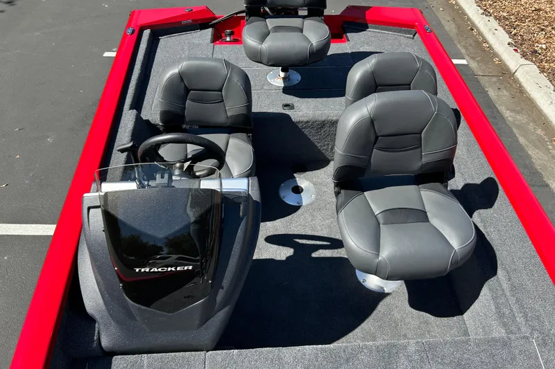 Slide: The Image of 2026 Tracker Pro Team 175 Crappie Edition boat with gray seats and red trim. - 16