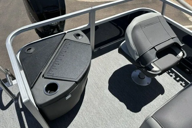 Slide: The Image of 2026 Sun Tracker Bass Buggy 18 DLX interior with seating and storage features. - 14