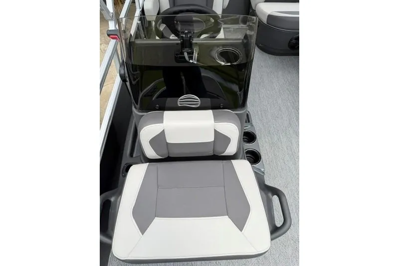 Slide: The Image of 2026 Sun Tracker Bass Buggy 16 XL Select boat interior with gray and white seating. - 6