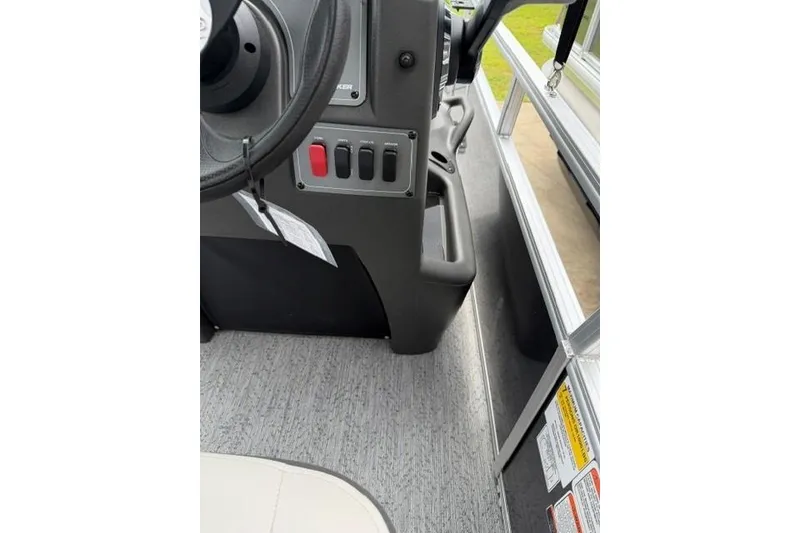 Slide: The Image of 2026 Sun Tracker Bass Buggy 16 XL Select interior dashboard and controls. - 11
