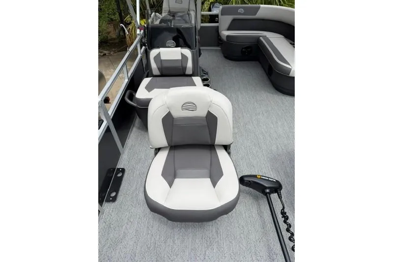 Slide: The Image of 2026 Sun Tracker Bass Buggy 16 XL Select interior with gray and white seating. - 9