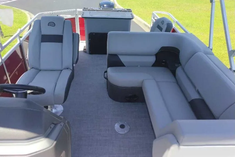 Slide: The Image of Interior of 2026 Sun Tracker SportFish 20 DLX pontoon boat with gray seating. - 5