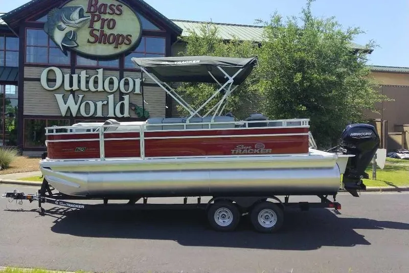 Slide: The Image of 2026 Sun Tracker SportFish 20 DLX pontoon boat at Bass Pro Shops Outdoor World. - 9