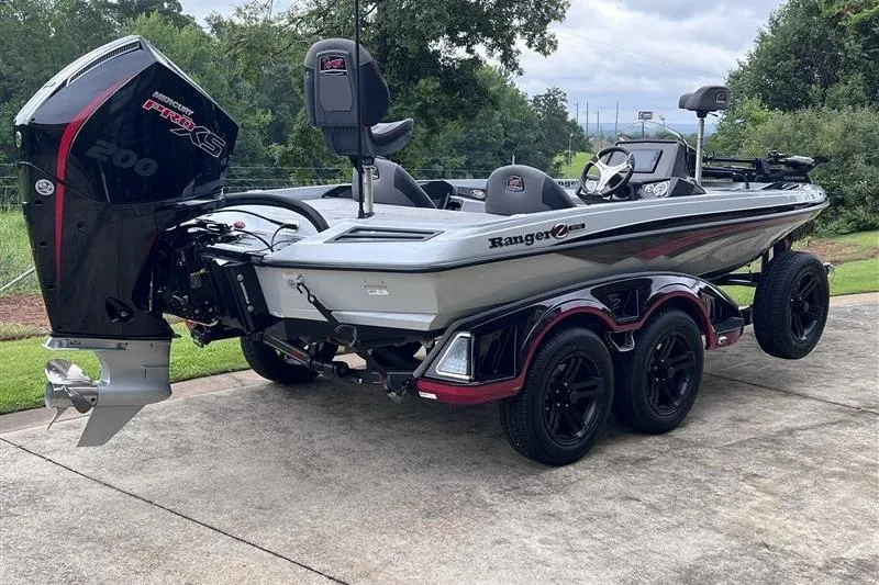 Slide: The Image of 2026 Ranger Z518 Cup-Equipped boat with Mercury Pro XS engine on a driveway. - 4