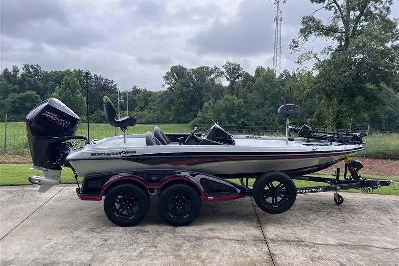 Slide: The Image of 2026 Ranger Z518 Cup-Equipped boat on trailer, parked outdoors. - 5
