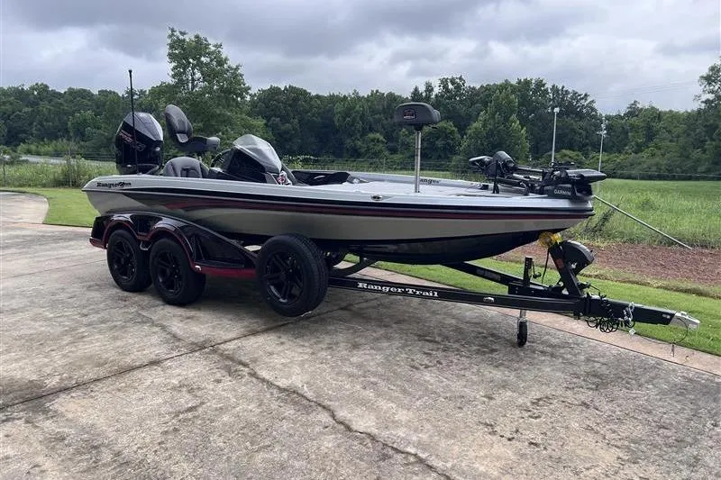 Slide: The Image of 2026 Ranger Z518 Cup-Equipped boat on trailer, parked outdoors on a cloudy day. - 6