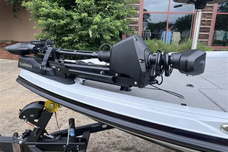 Slide: The Image of 2026 Ranger Z518 Cup-Equipped boat with Garmin trolling motor, parked outdoors. - 9