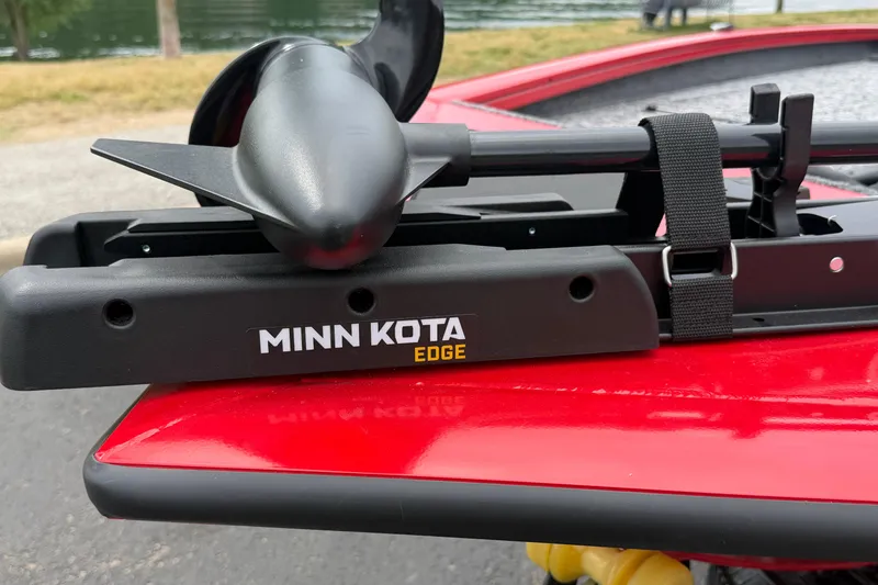 Slide: The Image of Minn Kota Edge trolling motor on red Tracker Pro Team 195 boat, 2026 model. - 10