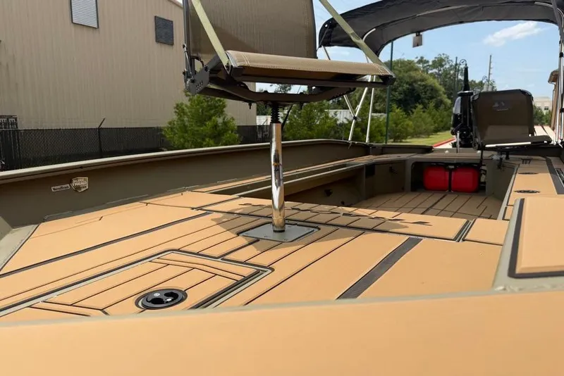Slide: The Image of 2026 Tracker Grizzly 1756 T Marsh boat interior with seating and deck details. - 15