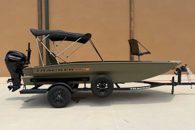 Slide: The Image of 2026 Tracker Grizzly 1756 T Marsh boat with Mercury engine on trailer. - 4